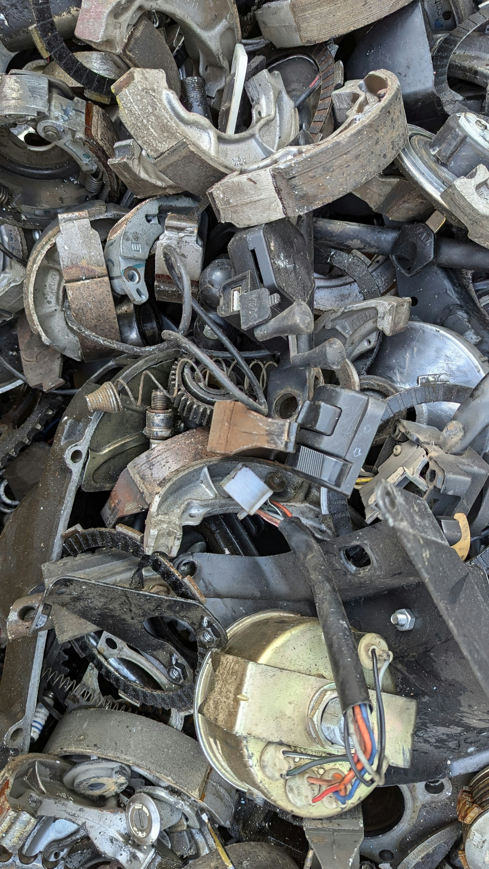 Pile of old scrap metal parts ready for recycling