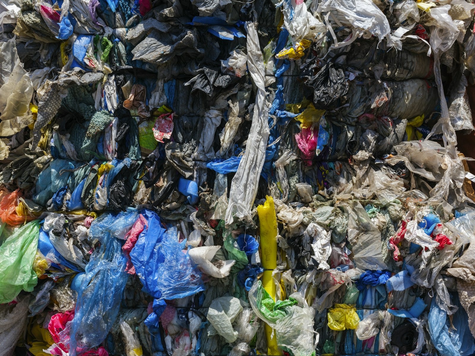 Large pile of dumped trash and plastic waste